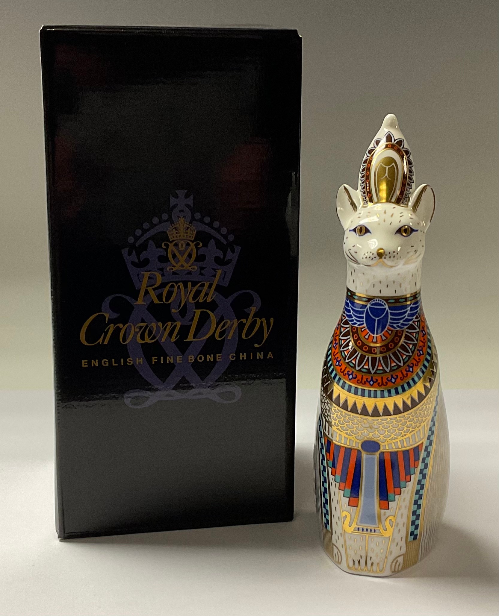 A Royal Crown Derby model, Royal Cats Egyptian, 22cm, printed mark in red, boxed