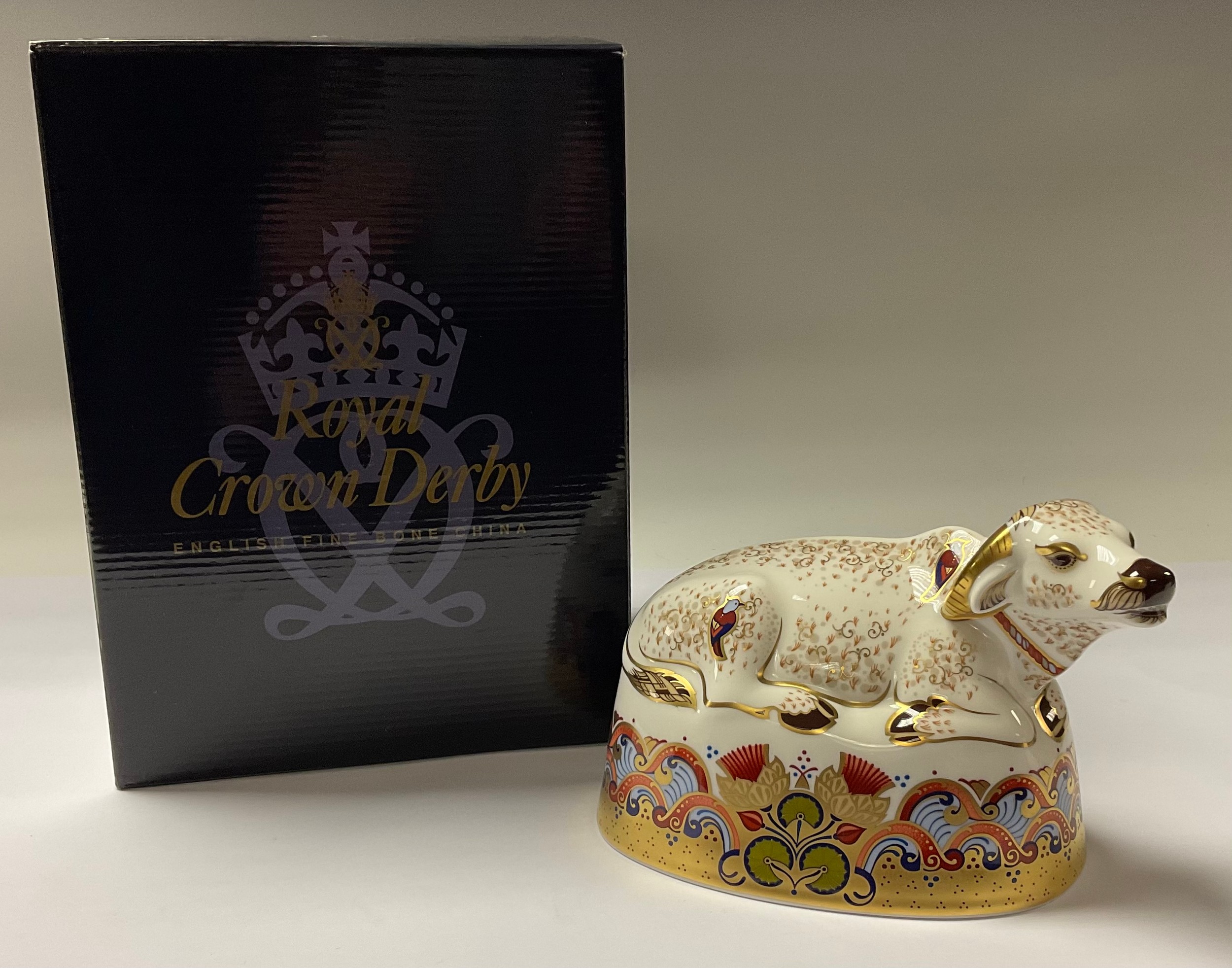 A Royal Crown Derby paperweight, Water Buffalo, gold stopper, 17cm long, printed mark,