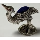 A silver novelty pin cushion, as a bird, marked 925