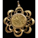 A George V gold half sovereign, 1914, 9ct gold mounted as a pendant, 6.66g