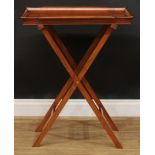 A walnut butler’s tray on stand, 82cm high overall, the tray 69cm wide, 48cm deep