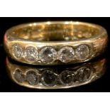 An 18ct gold graduated five stone diamond ring, size M, marked 750, .50, total diamond weight, 4.4g