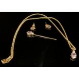 A suite of amethyst set base metal jewellery, comprising necklace, stick pin and earrings,