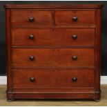 A Victorian mahogany chest, of two short and three long graduated drawers, shallow bun feet, 120.5cm