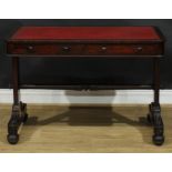 A William IV mahogany library table, rounded rectangular top with inset tooled and gilt writing