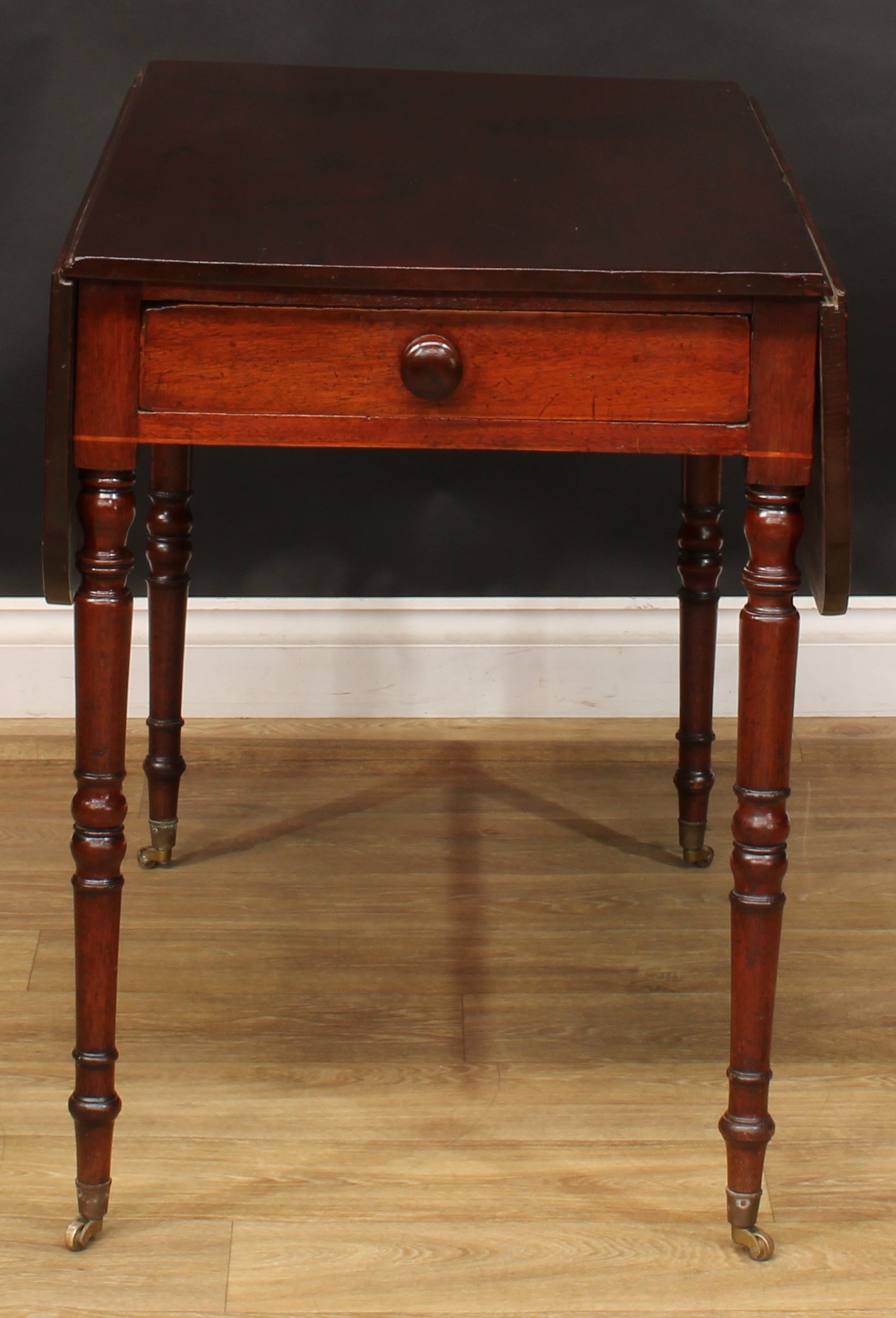 A George III mahogany Pembroke table, 73cm high, 55cm opening to 104cm wide, 97.5cm deep