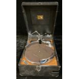 An HMV (His Master's Voice) table top wind-up gramophone, selection of 78s