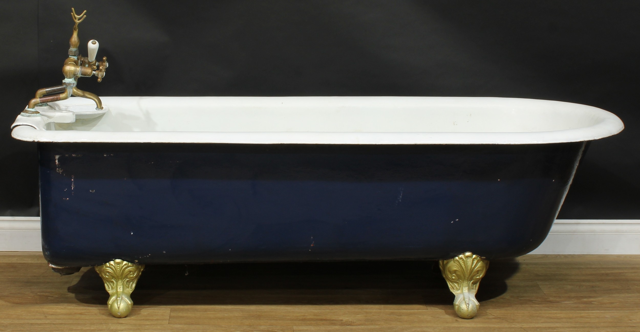 An early to mid-20th century cast iron roll top bath, ball and claw feet, 58cm high excluding - Image 2 of 2