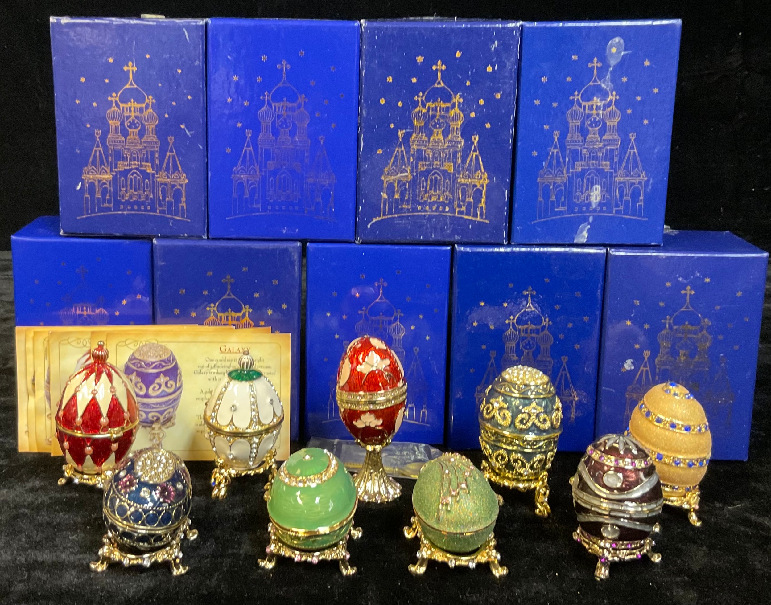 A set of nine Atlas Editions reproduction Fabergé Eggs on stands, including Lilac Flowers, - Image 2 of 2