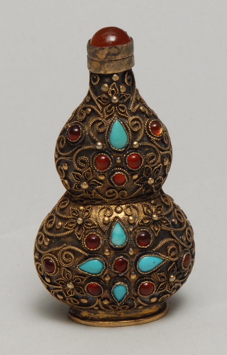 A Chinese silver gilt double gourd snuff bottle, applied with filigree and set with turquoise and