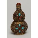 A Chinese silver gilt double gourd snuff bottle, applied with filigree and set with turquoise and