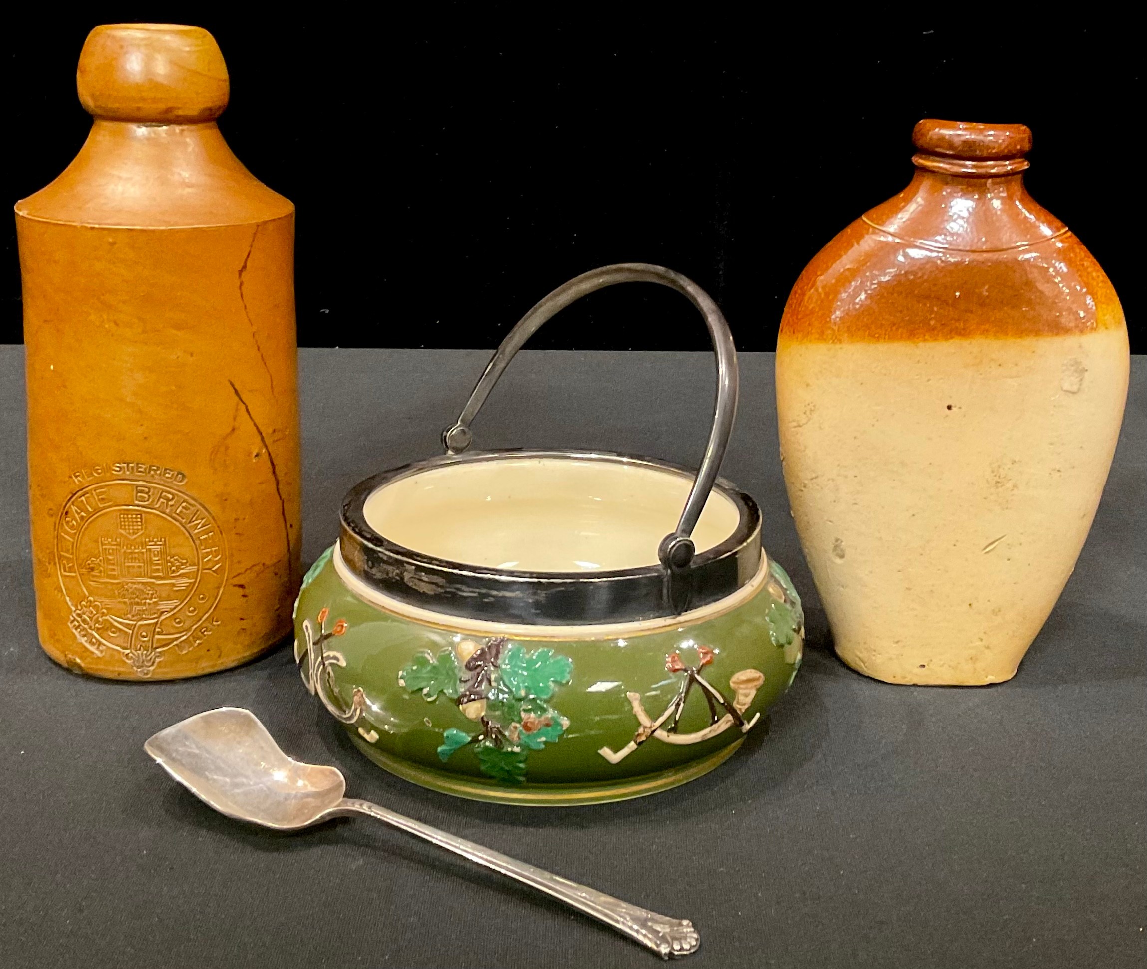 An HP & HB pottery preserve pot, with hunting motifs; a 19th century salt glazed flask; a Reigate