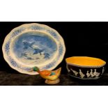 An Art Deco Phoenix ware octagonal bowl, decorated with white ducks on a black ground, 23cm