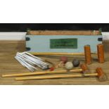Sport - a part croquet set, comprising four mallets, a hoop mallet, three balls, hoops and clips,