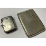 A silver matchbook case, Birmingham 1930; a silver vesta case, Birmingham 1904 (2)