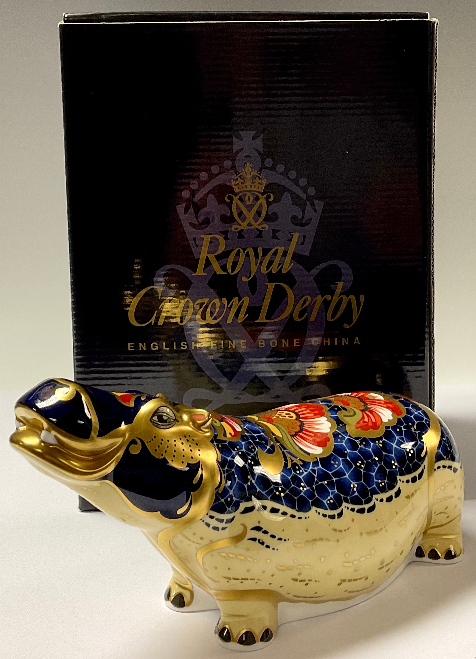 A Royal Crown Derby paperweight, Hippopotamus, gold stopper, boxed