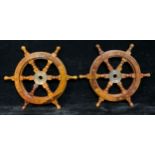 A pair of contemporary miniature hardwood and brass stained ship's wheels, each 32cm wide