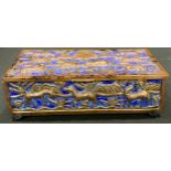 A Chinese copper and cobalt blue enamel box and cover, applied with equine motifs in relief, 18cm