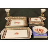 A Wedgwood Clio pattern dressing table set, comprising a pair of boudoir candlesticks, shaped