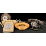 An RTT dial up telephone, RTT - 56 A; another Comdial retro dial up telephone, a reproduction; an