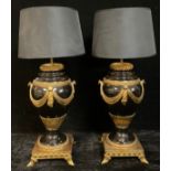 A pair of contemporary Louis XVI style gilt metal and porcelain table lamps, approx. 53cm over