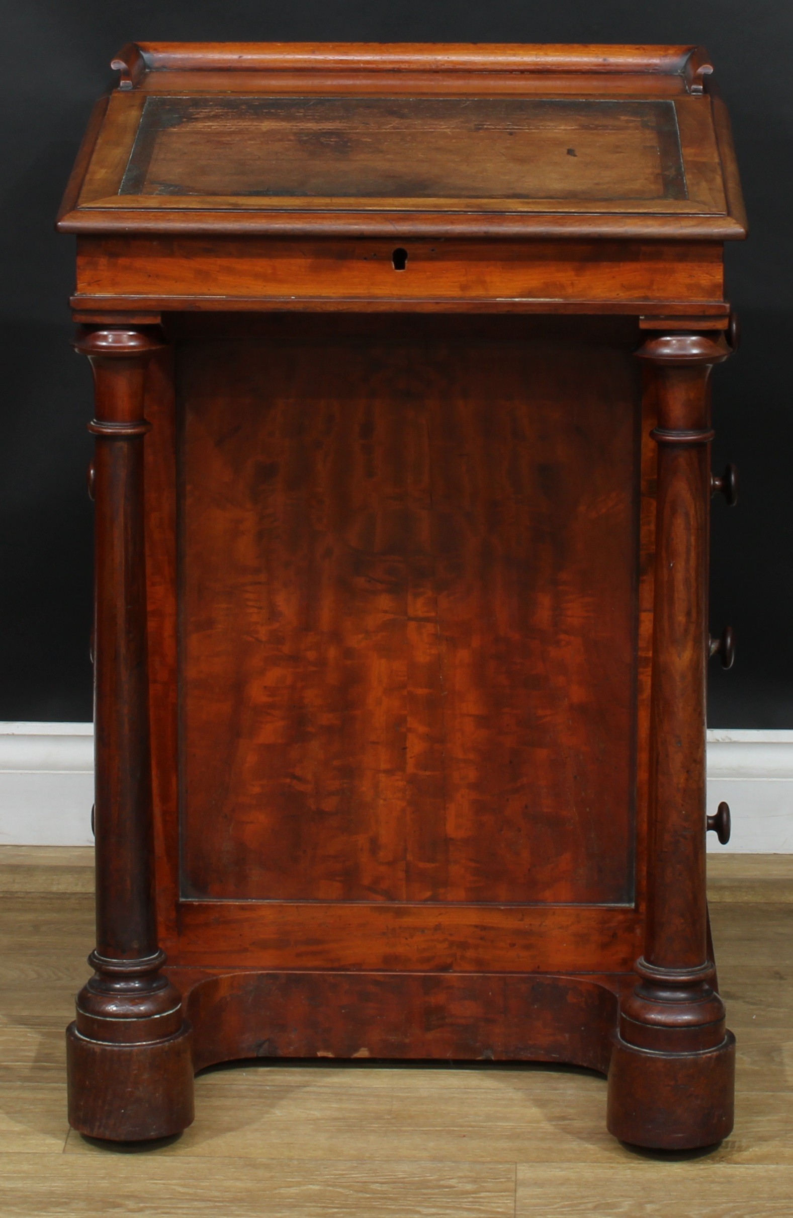 A 19th century mahogany Davenport desk, 83.5cm high, 54cm wide, 54cm deep