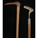 A Pitcairn Island walking cane, the handle carved as the stylised head of a bird; a ‘Sunday stick’