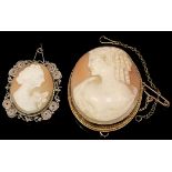 A 9ct gold mounted oval shell cameo brooch, carved as a maiden with ringlets, safety chain, 4,5cm; a