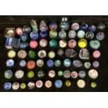 A quantity of glass paperweights and dumps, various designs and shapes, Murano, Mdina, etc (