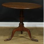 A George III oak tripod occasional table, 72cm high, 84cm diameter, c.1800