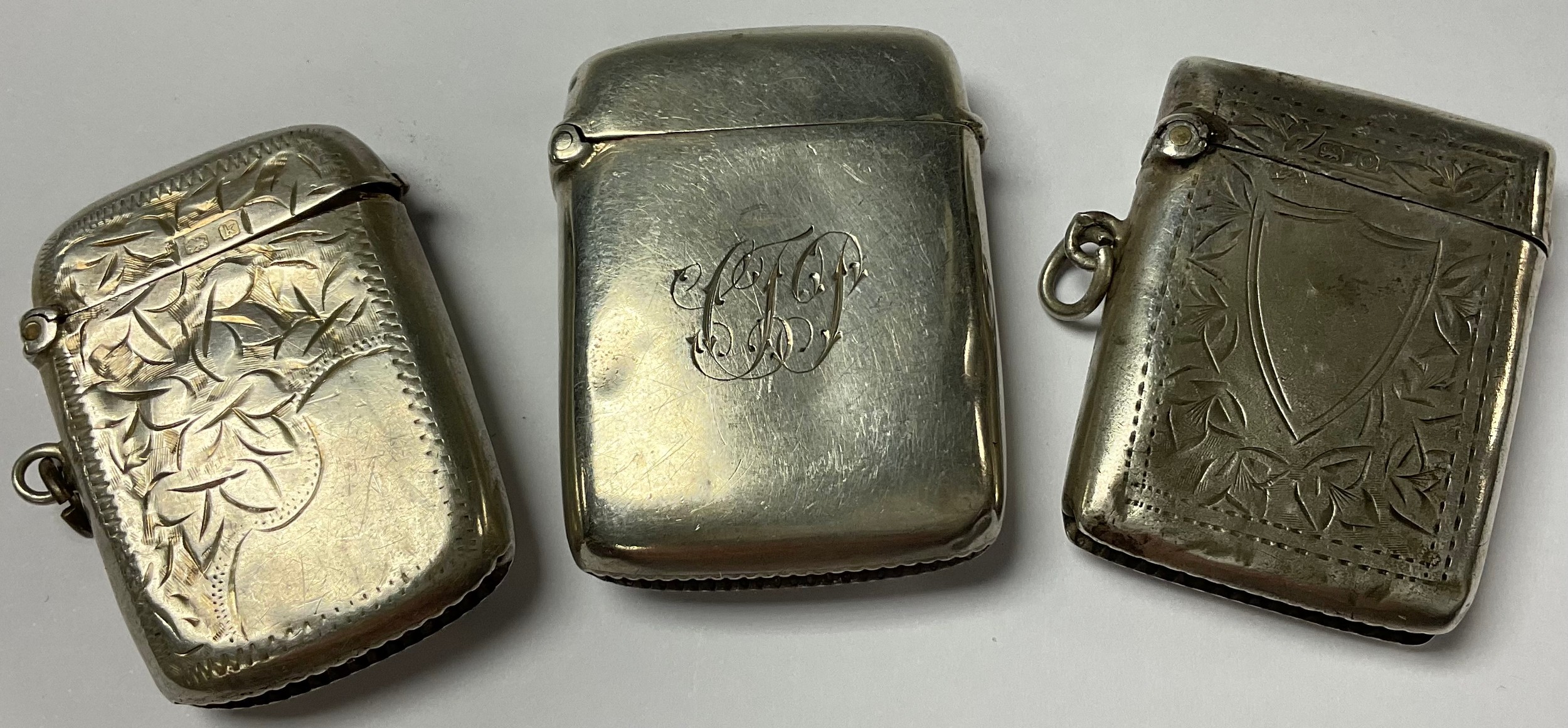 A Victorian silver vesta case, Birmingham 1894; others, Birmingham 1913; Birmingham 1909 (3)