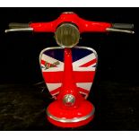 A novelty table lamp, modelled as a Vespa handlebar and Union Jack front panel, 33.5cm high, 41cm