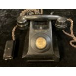 A mid 20th century bakelite telephone and handset, Ripley exchange, boxed