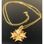 A 9ct gold Maltese cross pendant, set with stones