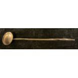 A Georgian silver toddy ladle, inscribed SWA, balleen handle, 39cm long