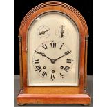 A German mahogany cased bracket clock, Roman numerals to dial, with key, 34cm high