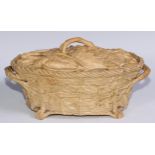 A 19th century drabware oval game pie dish and cover, as a basket of game, 34cm wide, c.1850