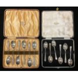 A set of six silver teaspoons, Birmingham 1932, associated case; another, Sheffield 1958; 116.5g (2)