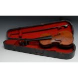 A violin, the one-piece back 33.5cm long excluding button, ebony tuning pegs, 57cm long overall, the