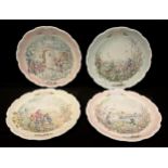 A set of four Royal Albert Wind in the Willows pattern shaped circular collector's plates, The