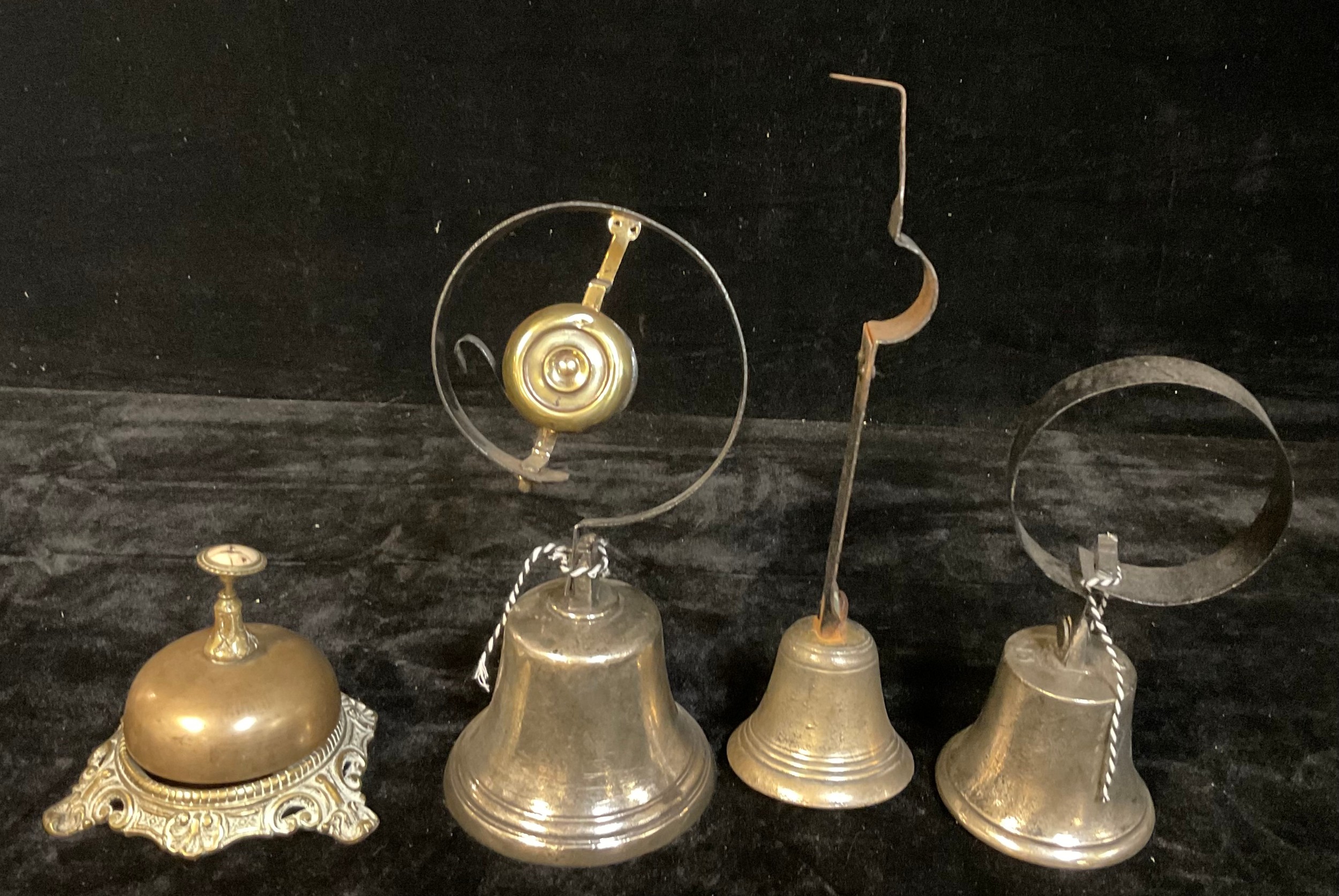A shop bell, three others; a brass counter/desk bell (4)