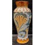 A Doulton Lambeth salt glazed stoneware slender inverted baluster vase, decorated by Eliza Simmance,