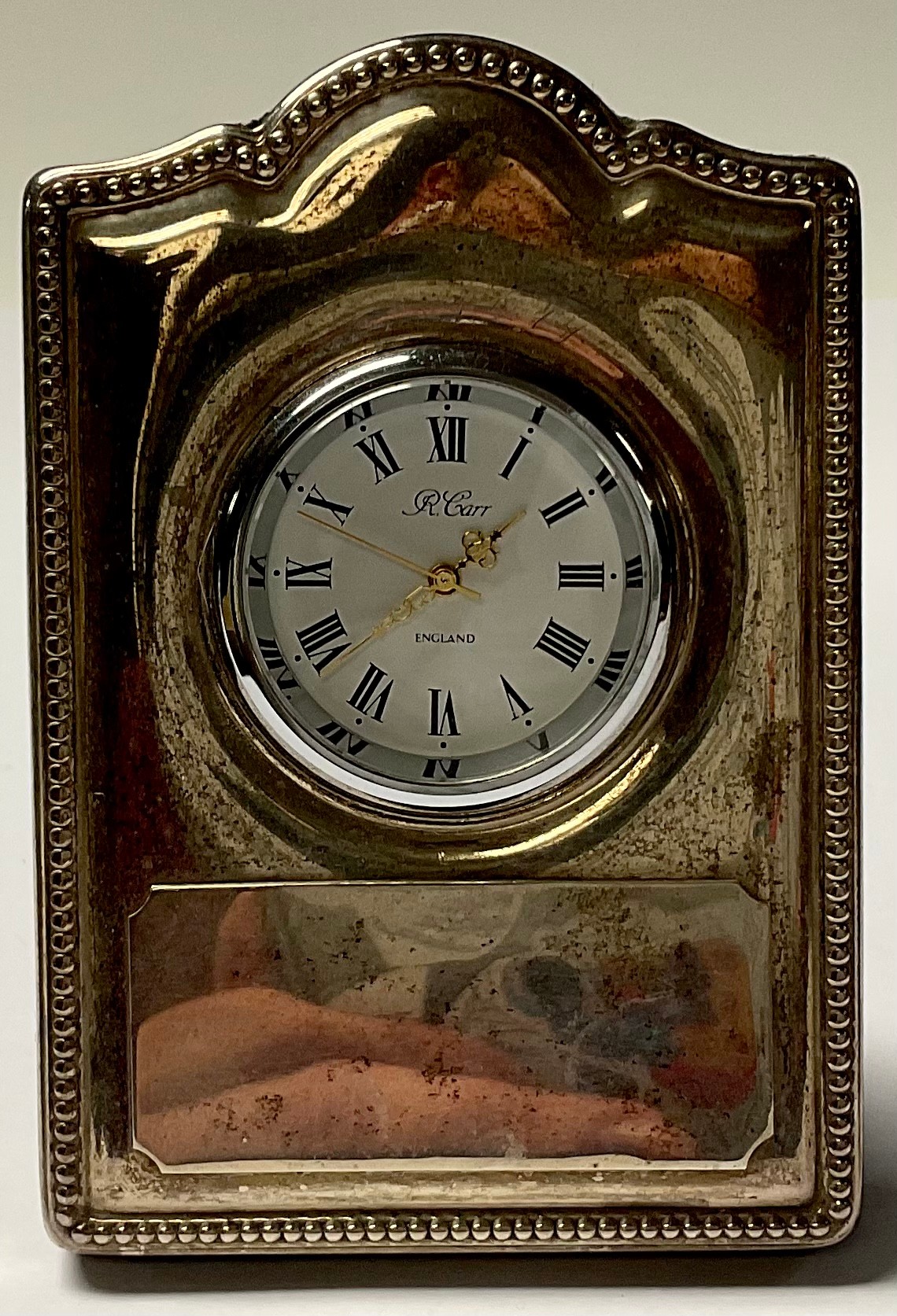 A silver easel desk clock, 9cm high, Sheffield 1997