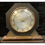 An Art Deco brass mounted octagonal mantel clock, 20cm high