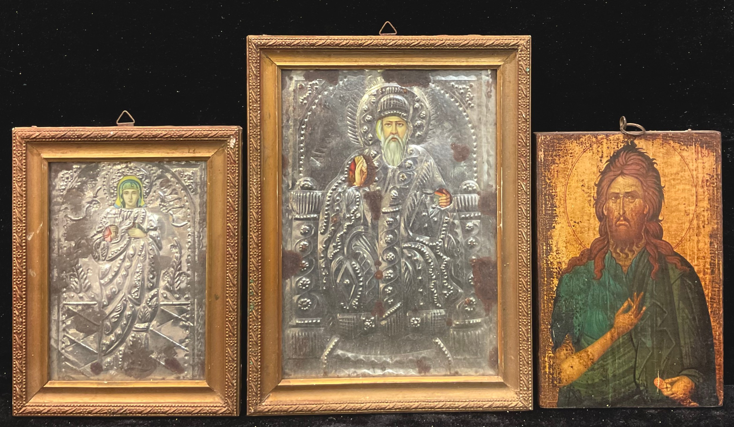 An Eastern Orthodox icon, 30cm x 22cm over gilt frame; others similar (3)