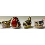 A Royal Crown Derby paperweight, Robin, gold stopper; others, Goldcrest, Blue Tit, gold stoppers;