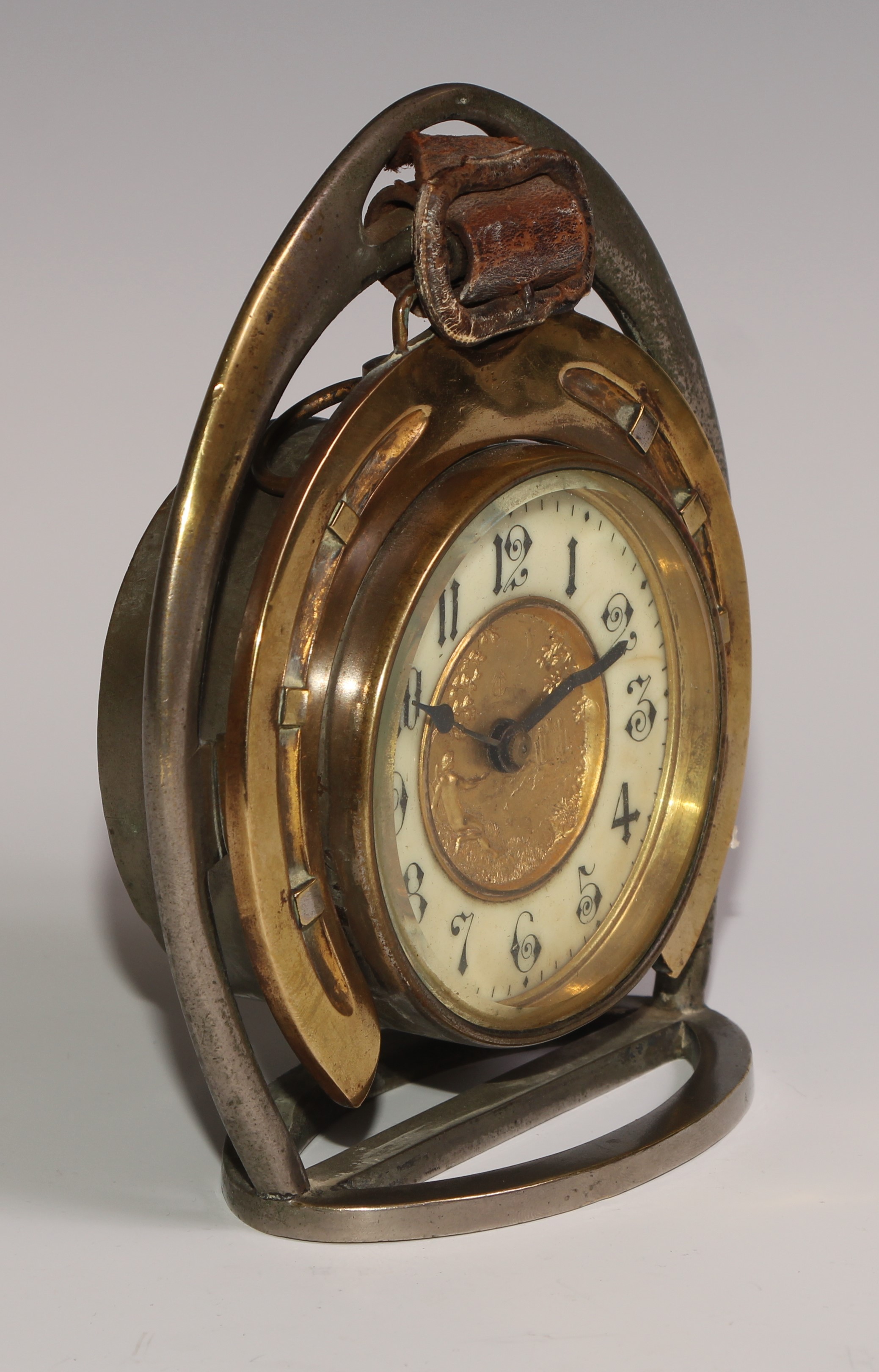 A late Victorian novelty timepiece, of equestrian interest as horseshoe within a riding stirrup, the - Image 2 of 4
