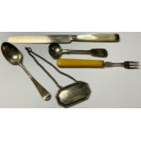 A silver mustard spoon, London 1840; a pickle fork, Sheffield 1906; a silver teaspoon; a decanter