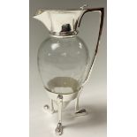 A reproduction 'Arts and Crafts' style silver plate mounted claret jug, in the manner of Christopher