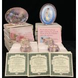 A set of four Ardleigh Elliott porcelain musical boxes, designed by Lena Liu, boxed; a set of four